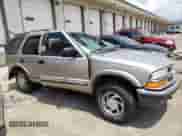 2001 Chevrolet Blazer LT z VIN 1GNDT13W91K209409, wystawiony jako Copart lot #64083034 z przebiegiem 218 833 mil mil oraz Szkoda całkowita • Salvage title. Historia ofert i sprzedaży dostępna na DreamBid. Obrazek 4.