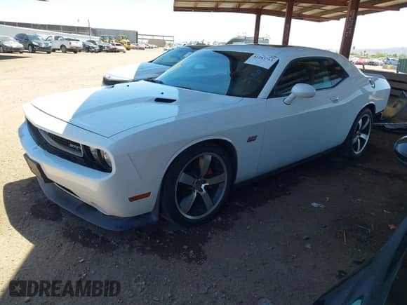 2013 Dodge Challenger SRT-8 with VIN 2C3CDYCJ1DH588064, listed as a IAAI auction lot 42283713 with 143,262 mi miles and . Bid and sale history available at DreamBid. Image 2.