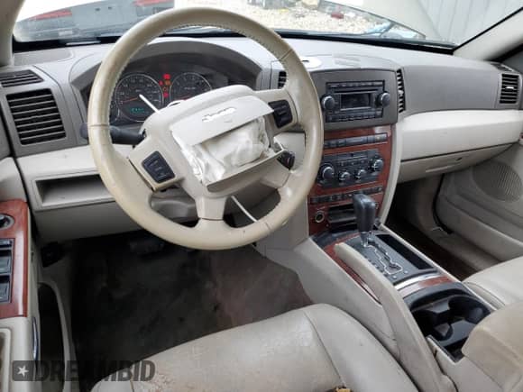 2006 Jeep Grand Cherokee Limited with VIN 1J4HS58N66C211974, listed as a Copart auction lot 60281945 with 220,229 mi miles and Salvage title. Bid and sale history available at DreamBid. Image 8.