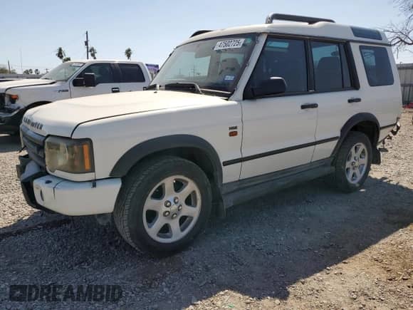 2004 Land Rover Discovery with VIN SALTP19494A839464, listed as a Copart auction lot 47502725 with 128,996 mi miles and Salvage title. Bid and sale history available at DreamBid. Image 1.