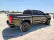 2023 Chevrolet Colorado 4WD Trail Boss с VIN 1GCPTEEKXP1133253, выставлен на аукционе Copart как лот 70961615 с пробегом 33 839 миль миль и Списание • Salvage title. История ставок и продаж доступна на DreamBid. Изображение 3.
