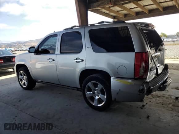 2010 Chevrolet Tahoe LTZ с VIN 1GNUKCE06AR290528, выставлен на аукционе Copart как лот 67053115 с пробегом 183 190 миль миль и Списание • Salvage title. История ставок и продаж доступна на DreamBid. Изображение 2.