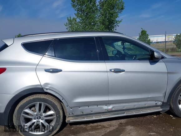 2014 Hyundai Santa Fe с VIN 5XYZU3LA0EG170989, выставлен на аукционе IAAI как лот 42311462 с пробегом 103 649 миль миль и . История ставок и продаж доступна на DreamBid. Изображение 6.