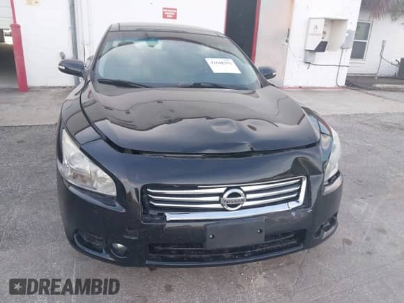 2014 Nissan Maxima SV z VIN 1N4AA5AP6EC483001, wystawiony jako IAAI lot #42648393 z przebiegiem 69 592 mil mil oraz . Historia ofert i sprzedaży dostępna na DreamBid. Obrazek 6.