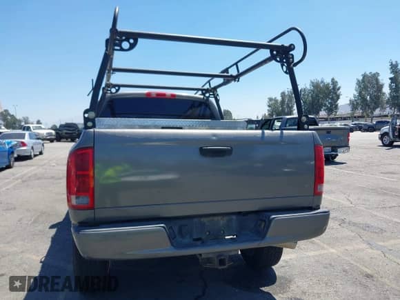 2004 Dodge 1500 SLT with VIN 1D7HU18D14S690006, listed as a IAAI auction lot 43018138 with 185,906 mi miles and . Bid and sale history available at DreamBid. Image 16.