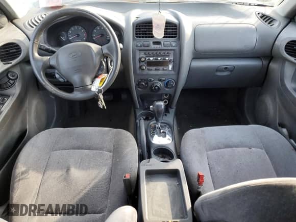 2003 Hyundai Santa Fe GLS с VIN KM8SC13D53U382460, выставлен на аукционе Copart как лот 70257874 с пробегом Не указан миль и Списание • Salvage title. История ставок и продаж доступна на DreamBid. Изображение 8.