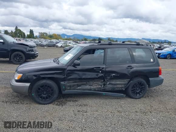 1999 Subaru Forester L with VIN JF1SF6357XH748229, listed as a IAAI auction lot 43383123 with 225,562 mi miles and . Bid and sale history available at DreamBid. Image 14.