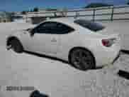 2014 Scion FR-S z VIN JF1ZNAA1XE8708292, wystawiony jako Copart lot #69932195 z przebiegiem 247 484 mil mil oraz Szkoda całkowita • Salvage title. Historia ofert i sprzedaży dostępna na DreamBid. Obrazek 2.