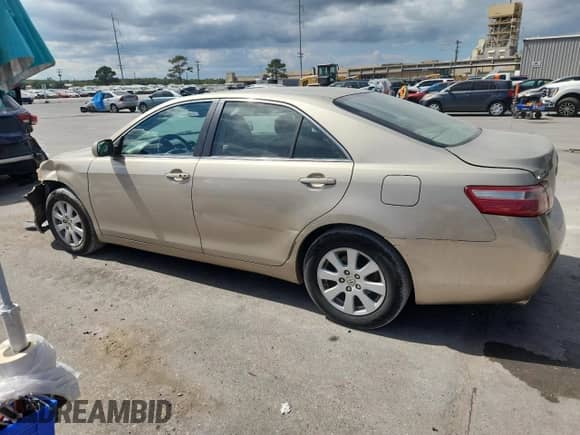 2007 Toyota Camry LE с VIN 4T1BK46K57U020343, выставлен на аукционе Copart как лот 81714305 с пробегом 174 808 миль миль и Списание • Salvage title. История ставок и продаж доступна на DreamBid. Изображение 2.