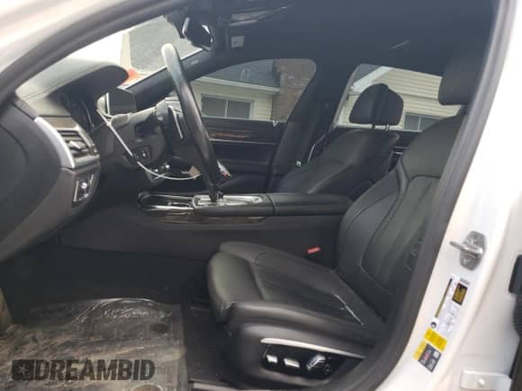 2017 BMW 7 Series 740e xDrive with VIN WBA7J2C36HG497830, listed as a Copart auction lot 79948304 with 43,029 mi miles and Salvage title. Bid and sale history available at DreamBid. Image 7.