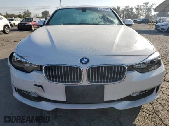 2013 BMW 3 Series 328i with VIN WBA3C1G54DNN93959, listed as a Copart auction lot 82182885 with 49,418 mi miles and Salvage title. Bid and sale history available at DreamBid. Image 5.