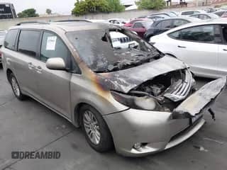 2015 Toyota Sienna XLE with VIN 5TDYK3DC5FS545345, listed as a IAAI auction lot 42280661 with Not provided miles and . Bid and sale history available at DreamBid. Image 1.