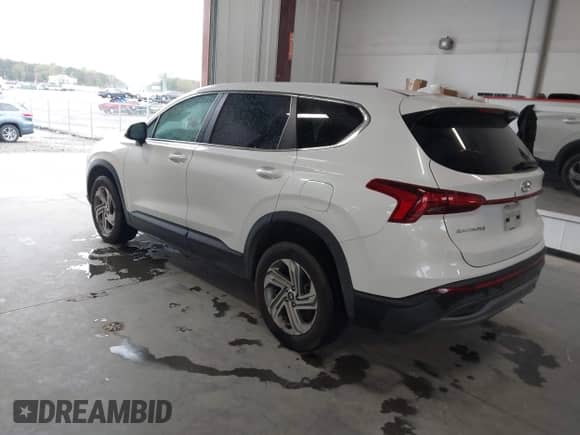 2021 Hyundai Santa Fe SE with VIN 5NMS1DAJ2MH352913, listed as a IAAI auction lot 43548098 with 93,758 mi miles and . Bid and sale history available at DreamBid. Image 3.