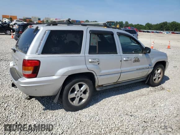 2004 Jeep Grand Cherokee Overland с VIN 1J8GW68J54C271033, выставлен на аукционе Copart как лот 66160055 с пробегом 203 651 миль миль и Чистый • Clean title. История ставок и продаж доступна на DreamBid. Изображение 3.