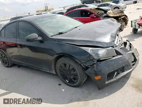 2013 Chevrolet Cruze LS z VIN 1G1PA5SHXD7250122, wystawiony jako Copart lot #80866665 z przebiegiem 214 478 mil mil oraz Szkoda całkowita • Salvage title. Historia ofert i sprzedaży dostępna na DreamBid. Obrazek 13.