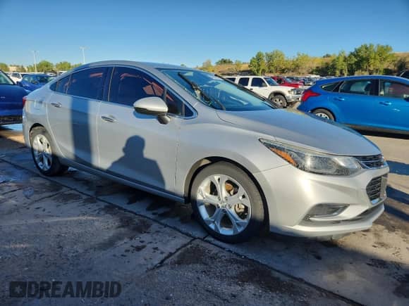 2018 Chevrolet Cruze Premier с VIN 1G1BF5SM8J7108758, выставлен на аукционе Copart как лот 84032945 с пробегом 75 319 миль миль и Списание • Salvage title. История ставок и продаж доступна на DreamBid. Изображение 4.