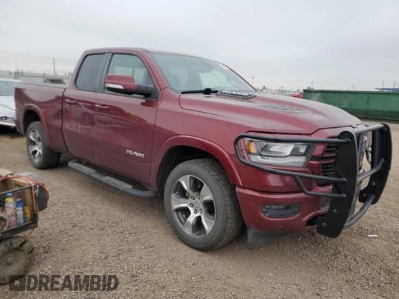 2019 Ram 1500 Laramie z VIN 1C6SRFDT0KN746743, wystawiony jako Copart lot #69297895 z przebiegiem 158 279 mil mil oraz Nie do naprawy • Non repairable. Historia ofert i sprzedaży dostępna na DreamBid. Obrazek 4.