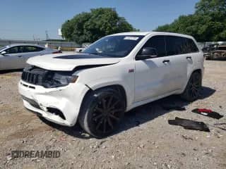 2017 Jeep Grand Cherokee SRT с VIN 1C4RJFDJ0HC695150, выставлен на аукционе Copart как лот 61623755 с пробегом 85 587 миль миль и Списание • Salvage title. История ставок и продаж доступна на DreamBid. Изображение 1.