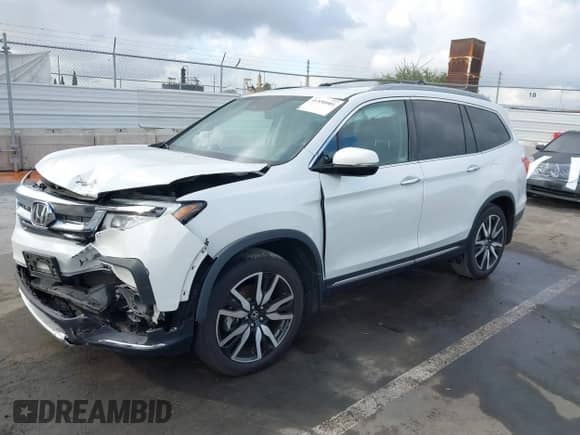 2022 Honda Pilot Elite с VIN 5FNYF6H02NB043594, выставлен на аукционе IAAI как лот 41550081 с пробегом 56 323 миль миль и . История ставок и продаж доступна на DreamBid. Изображение 18.