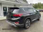 2019 Hyundai Santa Fe Ultimate with VIN 5NMS5CAA5KH040953, listed as a IAAI auction lot 43055057 with 139,633 mi miles and . Bid and sale history available at DreamBid. Image 4.