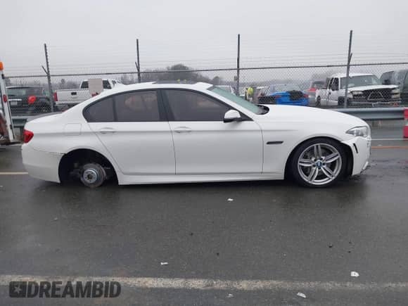 2014 BMW 5 Series 535d with VIN WBAXA5C58ED690612, listed as a IAAI auction lot 41570616 with 95,124 mi miles and . Bid and sale history available at DreamBid. Image 14.