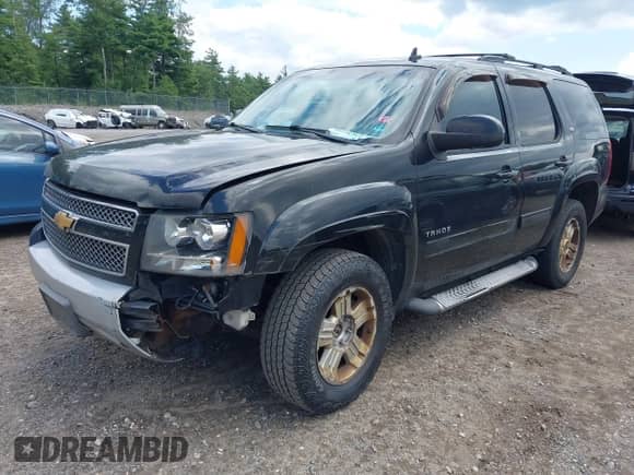 2012 Chevrolet Tahoe LT z VIN 1GNSKBE04CR271335, wystawiony jako IAAI lot #42879530 z przebiegiem 266 537 mil mil oraz . Historia ofert i sprzedaży dostępna na DreamBid. Obrazek 17.