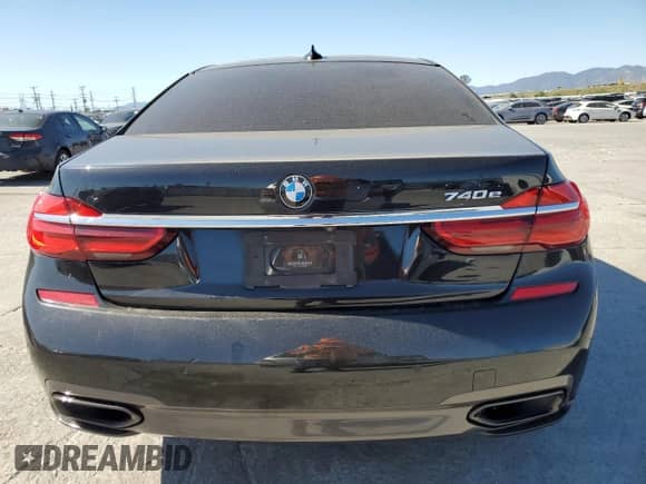 2018 BMW 7 Series 740e xDrive with VIN WBA7J2C50JG938505, listed as a Copart auction lot 50485725 with 94,535 mi miles and Salvage title. Bid and sale history available at DreamBid. Image 6.