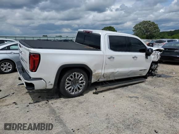 2024 GMC Sierra 1500 Denali Ultimate with VIN 1GTUUHE86RZ312786, listed as a Copart auction lot 59131065 with 20,998 mi miles and Salvage title. Bid and sale history available at DreamBid. Image 3.