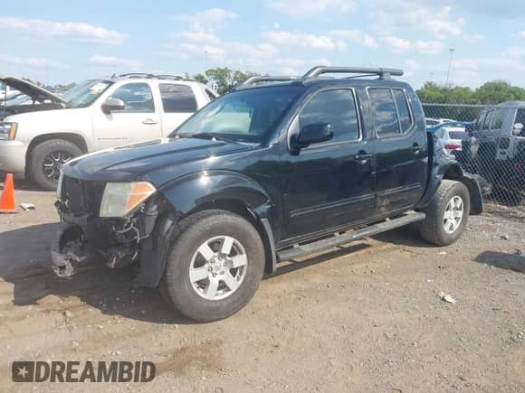 2005 Nissan Frontier SE with VIN 1N6AD07UX5C418604, listed as a IAAI auction lot 43196214 with 252,593 mi miles and . Bid and sale history available at DreamBid. Image 2.