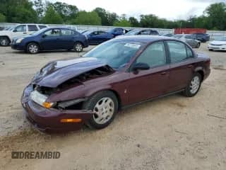 2001 Saturn SL with VIN 1G8ZK54761Z320887, listed as a Copart auction lot 54170885 with 99,265 mi miles and Salvage title. Bid and sale history available at DreamBid. Image 1.