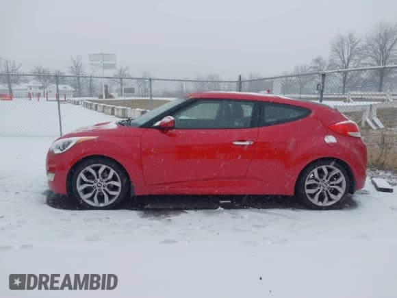 2014 Hyundai Veloster z VIN KMHTC6AD8EU214612, wystawiony jako IAAI lot #41258820 z przebiegiem 61 984 mil mil oraz . Historia ofert i sprzedaży dostępna na DreamBid. Obrazek 14.