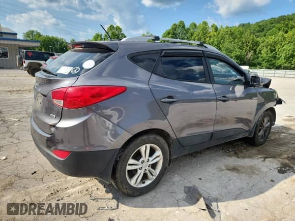 2015 Hyundai Tucson SE z VIN KM8JUCAG9FU991153, wystawiony jako Copart lot #63429555 z przebiegiem 160 649 mil mil oraz Szkoda całkowita • Salvage title. Historia ofert i sprzedaży dostępna na DreamBid. Obrazek 3.