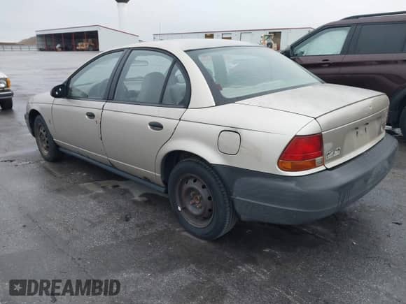 1998 Saturn SL z VIN 1G8ZH5289WZ313076, wystawiony jako IAAI lot #43542802 z przebiegiem 196 837 mil mil oraz . Historia ofert i sprzedaży dostępna na DreamBid. Obrazek 3.