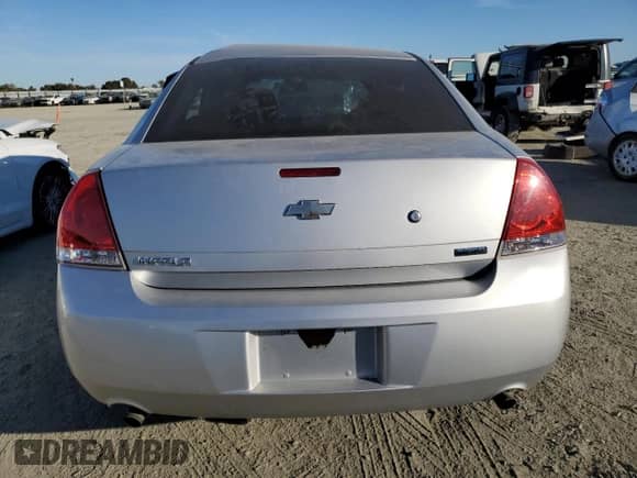 2012 Chevrolet Impala Police Police с VIN 2G1WD5E31C1226306, выставлен на аукционе Copart как лот 75308494 с пробегом Не указан миль и Списание • Salvage title. История ставок и продаж доступна на DreamBid. Изображение 6.