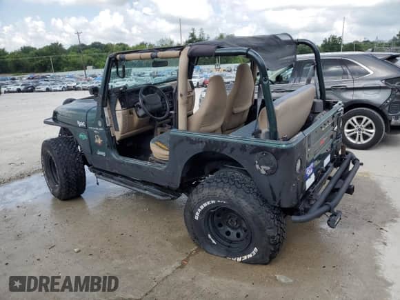 1999 Jeep Wrangler Sahara с VIN 1J4FY49S9XP425310, выставлен на аукционе Copart как лот 64079085 с пробегом 179 730 миль миль и На запчасти • Non repairable. История ставок и продаж доступна на DreamBid. Изображение 2.