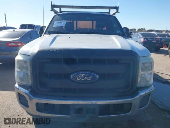 2013 Ford F-250 XL z VIN 1FT7X2A66DEB77864, wystawiony jako IAAI lot #41464637 z przebiegiem 289 428 mil mil oraz . Historia ofert i sprzedaży dostępna na DreamBid. Obrazek 12.