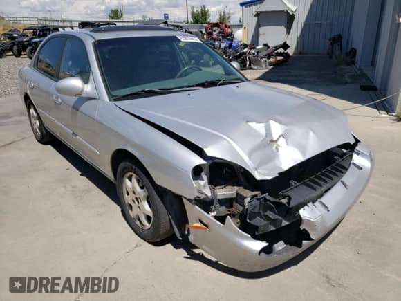2001 Hyundai Sonata GLS with VIN KMHWF35V81A392523, listed as a Copart auction lot 74584334 with 174,597 mi miles and Salvage title. Bid and sale history available at DreamBid. Image 4.