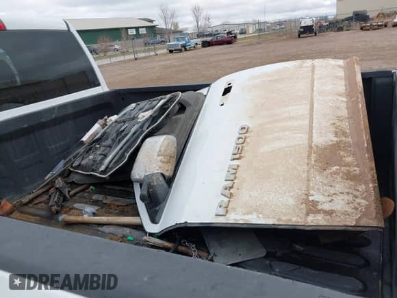 2014 Ram 1500 Express z VIN 1C6RR7FT5ES323647, wystawiony jako IAAI lot #41888044 z przebiegiem 184 317 mil mil oraz . Historia ofert i sprzedaży dostępna na DreamBid. Obrazek 12.