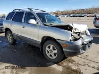 2002 Hyundai Santa Fe GLS z VIN KM8SC13D02U311312, wystawiony jako Copart lot #85943534 z przebiegiem 307 758 mil mil oraz Szkoda całkowita • Salvage title. Historia ofert i sprzedaży dostępna na DreamBid. Obrazek 4.