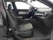 2025 Chevrolet Trax LT with VIN KL77LHEP5SC088309, listed as a IAAI auction lot 43202788 with 12,216 mi miles and . Bid and sale history available at DreamBid. Image 5.