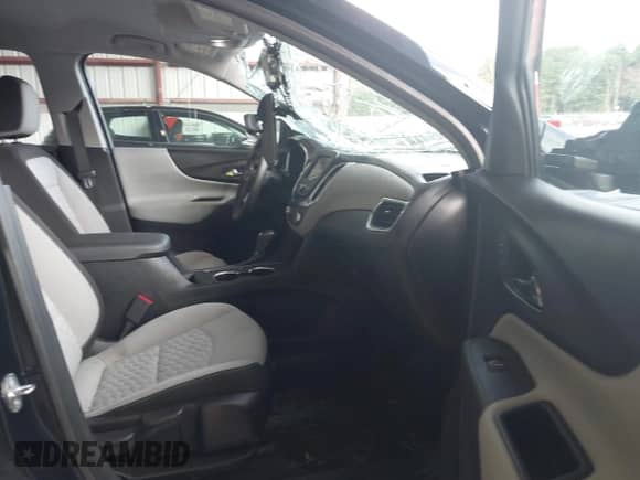 2020 Chevrolet Equinox LS z VIN 2GNAXSEV7L6181858, wystawiony jako IAAI lot #42783166 z przebiegiem 69 750 mil mil oraz . Historia ofert i sprzedaży dostępna na DreamBid. Obrazek 5.