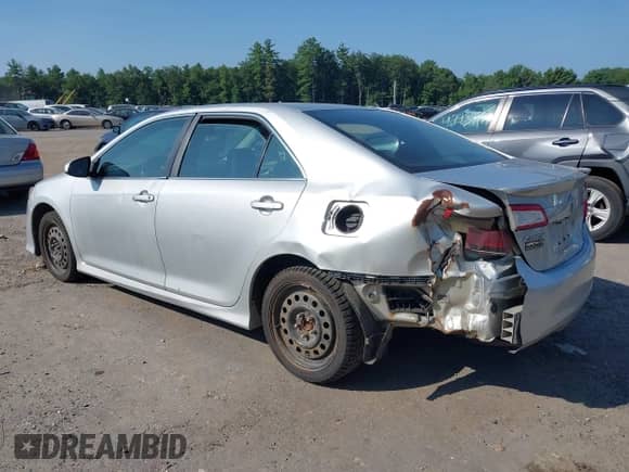 2014 Toyota Camry SE with VIN 4T1BF1FK9EU404237, listed as a IAAI auction lot 42948664 with 226,429 mi miles and . Bid and sale history available at DreamBid. Image 3.