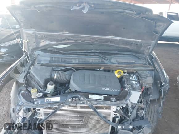 2019 Dodge Grand Caravan SE with VIN 2C4RDGBG2KR530803, listed as a IAAI auction lot 43348558 with 136,815 mi miles and . Bid and sale history available at DreamBid. Image 5.