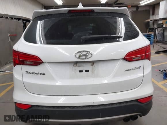 2014 Hyundai Santa Fe z VIN 5XYZW3LA2EG139219, wystawiony jako IAAI lot #42933762 z przebiegiem 148 301 mil mil oraz . Historia ofert i sprzedaży dostępna na DreamBid. Obrazek 16.