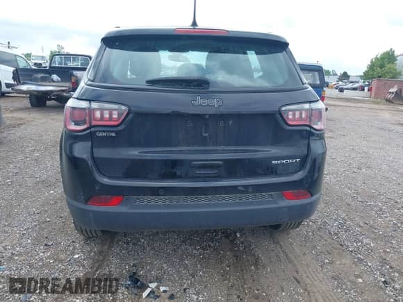 2018 Jeep Compass Sport with VIN 3C4NJCAB2JT187010, listed as a IAAI auction lot 42607545 with 94,715 mi miles and . Bid and sale history available at DreamBid. Image 16.