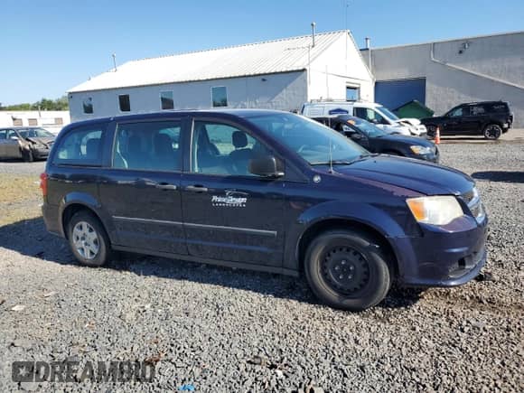 2013 Dodge Grand Caravan American Value with VIN 2C4RDGBG4DR606346, listed as a Copart auction lot 69964125 with 205,993 mi miles and Salvage title. Bid and sale history available at DreamBid. Image 4.