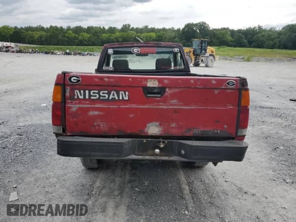 1990 Nissan Frontier z VIN 1N6SD11S1LC314338, wystawiony jako Copart lot #57546224 z przebiegiem 285 894 mil mil oraz Szkoda całkowita • Salvage title. Historia ofert i sprzedaży dostępna na DreamBid. Obrazek 6.
