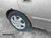 2005 Hyundai Elantra GLS with VIN KMHDN46D55U950645, listed as a IAAI auction lot 43359948 with 296,113 mi miles and . Bid and sale history available at DreamBid. Image 13.