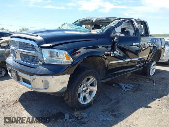 2015 Ram 1500 Laramie Limited with VIN 1C6RR7PT5FS552426, listed as a IAAI auction lot 42039997 with 167,944 mi miles and . Bid and sale history available at DreamBid. Image 2.
