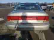 1999 Saturn SL with VIN 1G8ZK5270XZ212874, listed as a Copart auction lot 85317464 with 153,477 mi miles and Salvage title. Bid and sale history available at DreamBid. Image 6.